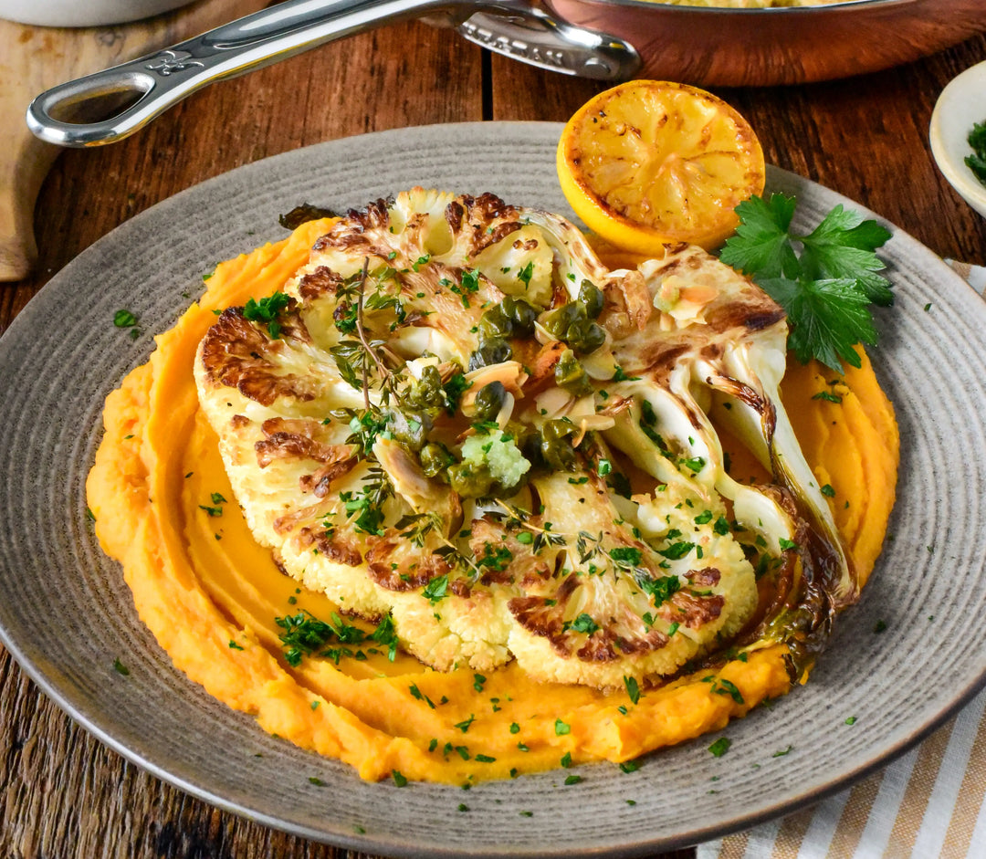 Golden Cauliflower Steaks with Whipped Sweet Potatoes, and Rustic Caper-Almond Gremolata