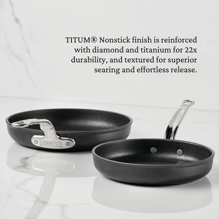 Two black TITUM® Fusion Nonstick Open Skillets—one with a stainless steel handle, one short-handled—are shown on white against marble. Text highlights their TITUM® nonstick finish, durable build, and Italian craftsmanship.