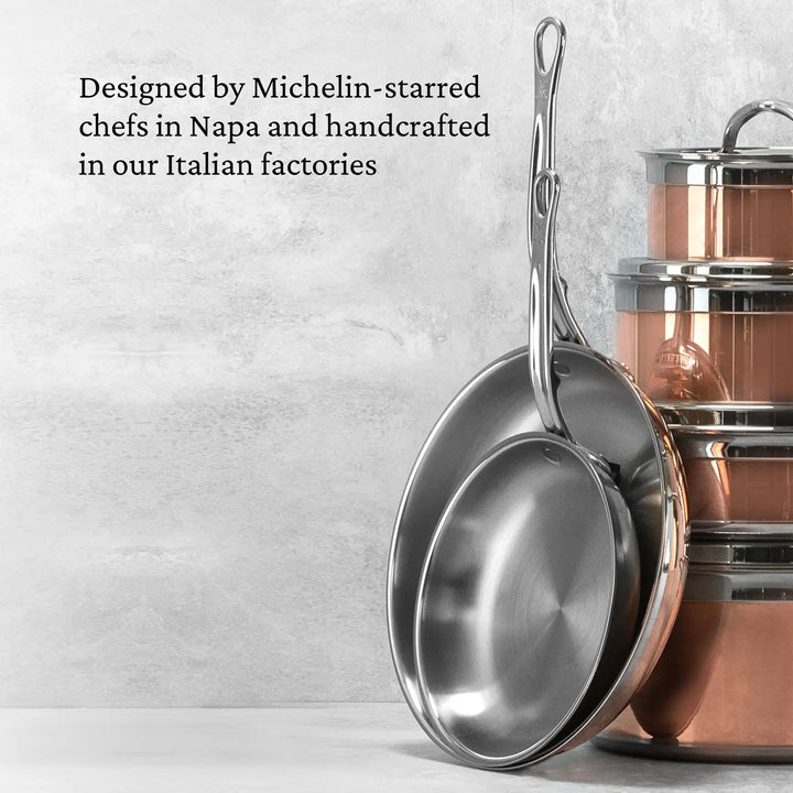 Two stainless steel frying pans rest against CopperBonds 3-quart Copper Induction Soup Pot. The background reads, Designed by Michelin-starred chefs in Napa and handcrafted in Italy. Induction compatible for perfect cooking precision.