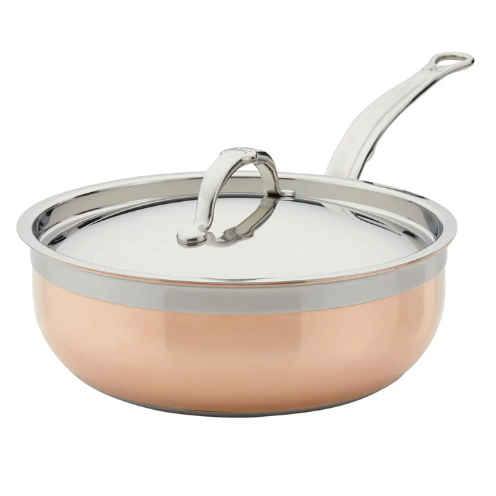 The CopperBond Copper Induction Essential Pans feature shiny stainless steel lids with curved handles and a polished finish. Their modern design includes an innovative copper core, making them induction compatible and offering both style and functionality in the kitchen.