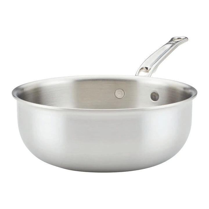 The Thomas Keller Insignia Commercial Clad Stainless Steel 2-Quart Saucier features a polished finish and sturdy handle, celebrated for exceptional heat conductivity. Its smooth, round design stands out against a plain white background.