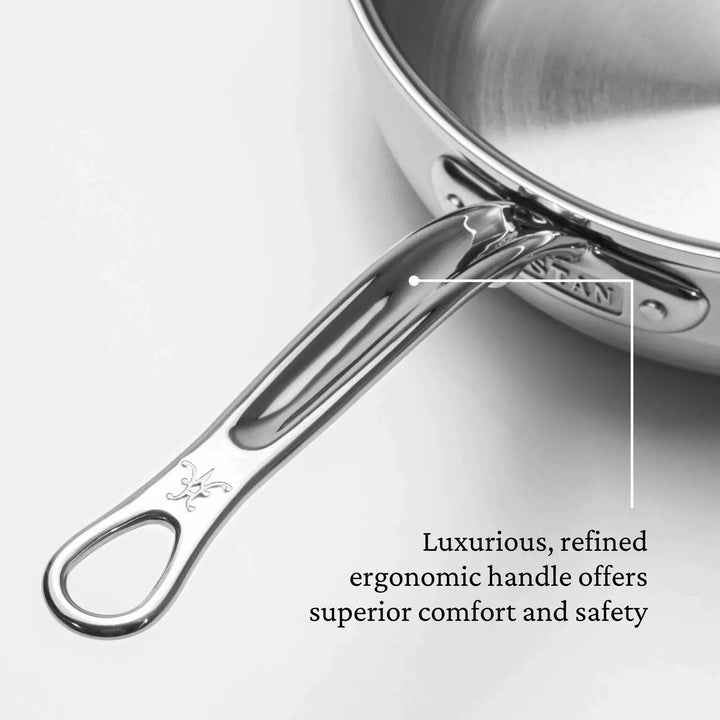 Close-up of a stainless steel saucepan handle with an ergonomic design from the ProBond Professional Clad Stainless Steel Essential Pans collection. It has a hanging hole, decorative engraving for luxury, and enhanced safety via a tri-ply aluminum core.