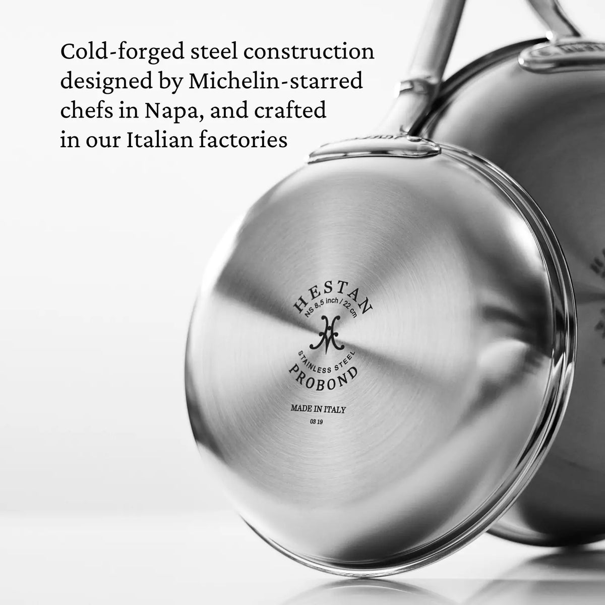A close-up of the stainless steel skillets bottom displays the ProBond logo and Made in Italy. It emphasizes its design by Michelin-starred chefs from Napa, setting a new standard for Professional Clad Stainless Steel TITUM® Nonstick Skillets.