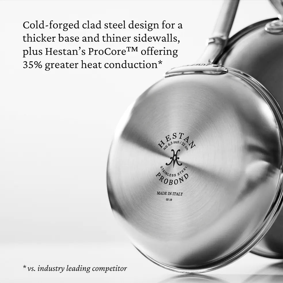 Close-up of the underside of a ProBond Professional Clad Stainless Steel Skillet, highlighting its cold-forged tri-ply design with a thicker base and thinner sidewalls for 35% better heat conduction than competitors.