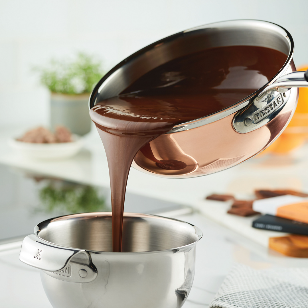 copperbond saucier pouring chocolate fudge