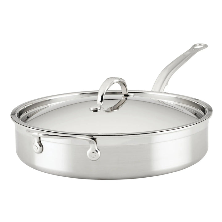 The ProBond Professional Clad Stainless Steel TITUM® Nonstick Sauté Pan, 3.5-Quart, is set against a white background with a long handle and reflective finish. Complete with a matching lid, it blends elegance and functionality for easy lifting and exceptional cooking experiences.