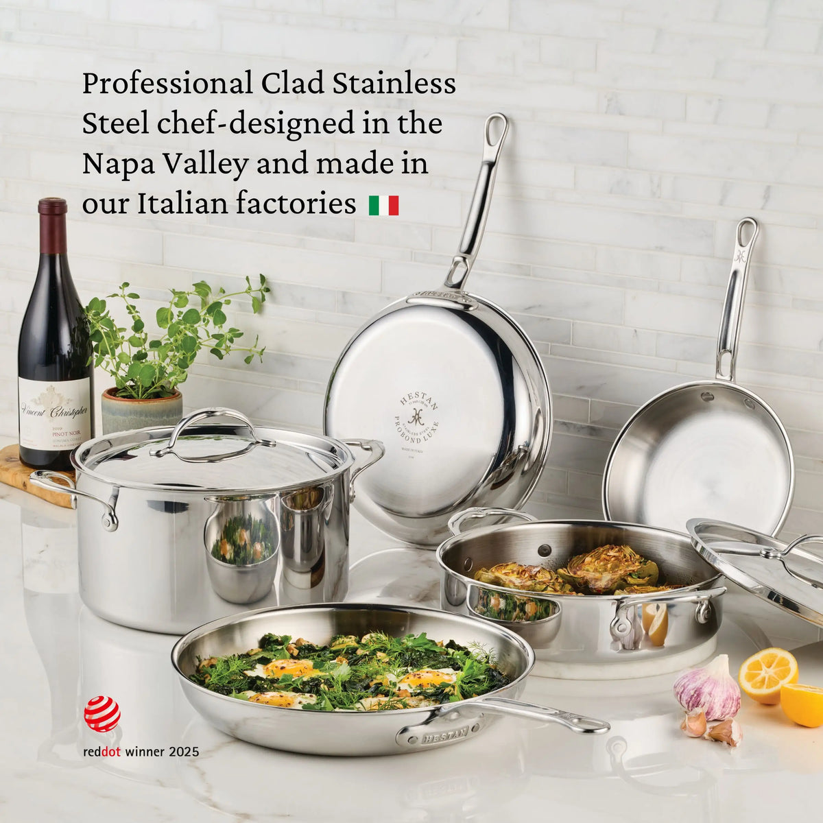 A set of Polished Clad Stainless Steel Skillets by ProBond® Luxe™ sits on the kitchen counter with tasty dishes, a wine bottle and glass nearby, while text above showcases the premium design and quality of this cookware.