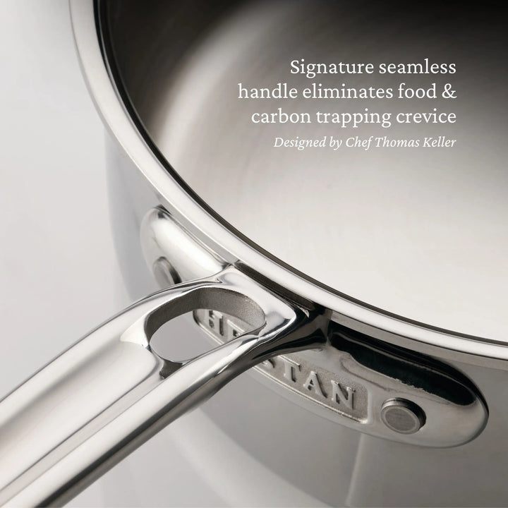Close-up of a ProBond® Luxe™ Polished Clad Stainless Steel Saucier Pan, 2-Quart. Text notes Chef Thomas Keller designed the seamless handle to prevent food and carbon traps.