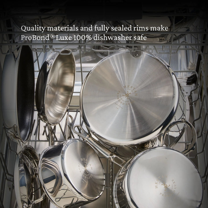 Open dishwasher filled with Polished Clad Stainless Steel Rondeaus by ProBond® Luxe™. Text at top states: "Quality materials and fully sealed rims make ProBond® Luxe™ 100% dishwasher safe.