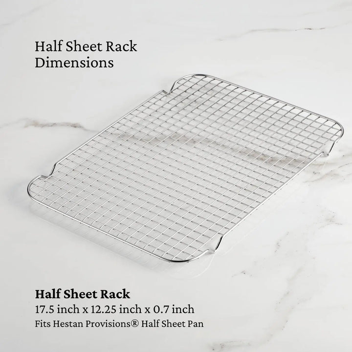 A rectangular half sheet rack with a grid pattern sits on a light surface. Text indicates dimensions of 17.5 x 12.25 x 0.7 inches, stating it fits the Hestan Provisions® Half Sheet Pan, built for durability with stainless steel like the OvenBond Tri-ply 4-Piece Set.