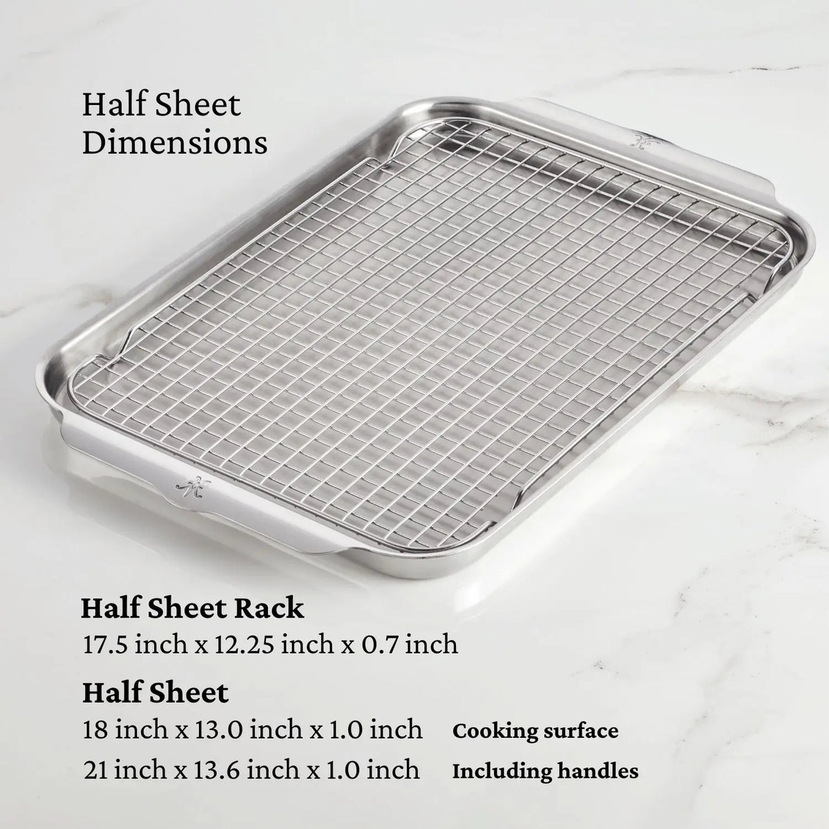 A metal half sheet pan with a stainless steel cooling rack placed on top, set against a marble background. Text next to the pan specifies dimensions for the half sheet and rack, covering both cooking surface and handles.