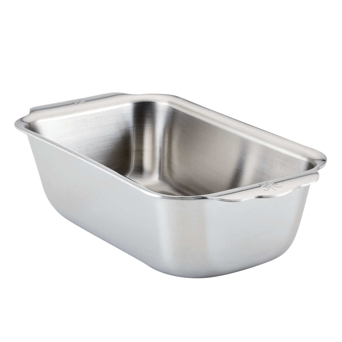 The Hestan Provisions OvenBond Tri-ply Stainless Steel 1-Pound Loaf Pan shines with its smooth, reflective surface and features two small handles. Designed to be warp-resistant, it elegantly rests on a plain white background.