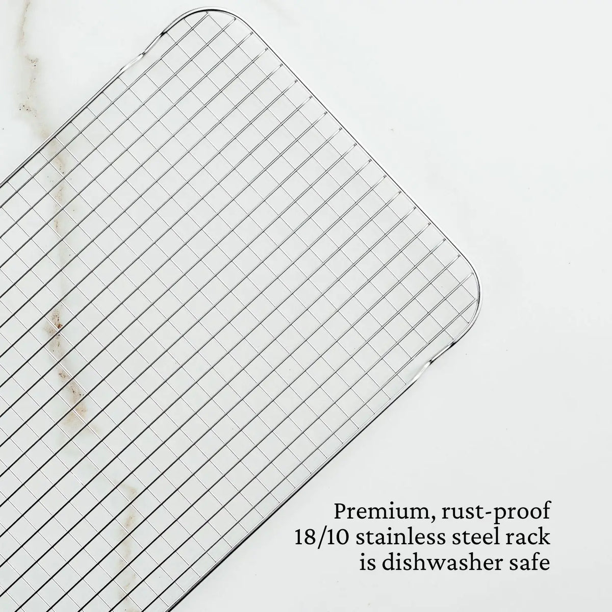 The Hestan OvenBond Tri-Ply Medium Sheet Pan & Rack, 12-in x 15-in, features a rust-proof 18/10 stainless steel rack that&
