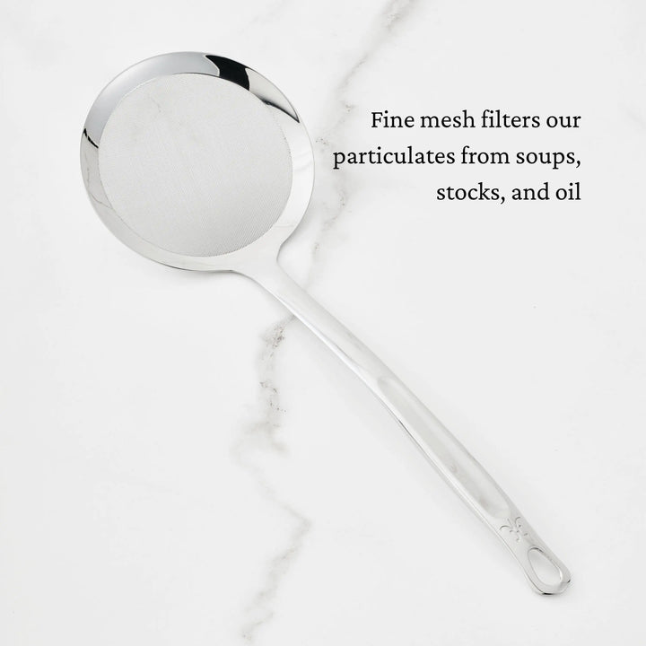 The Hestan Provisions Fine Mesh Skimmer, 16-inch, features fine mesh that filters out particulates from soups, stocks, and oil.
