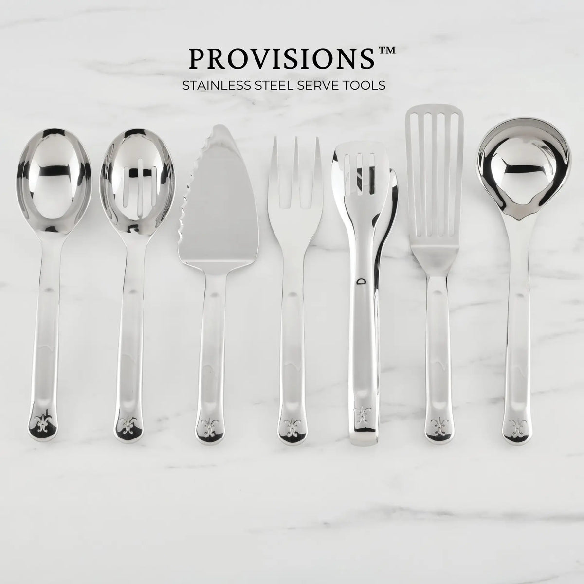 Seven stainless steel serving utensils—including the Hestan Provisions 10.5-inch Stainless Steel Pie & Cake Server—are arranged in a row on a white marble surface. Above them, the text reads: Hestan Provisions Serve Tools. These serving tools feature matching decorative handles, making them perfect for any chef’s kitchen collection.