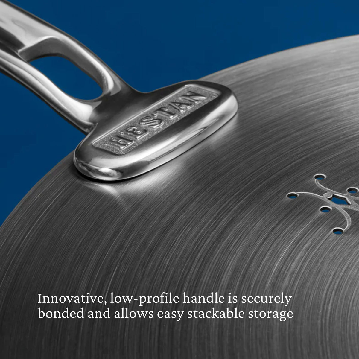 Close-up of a Thomas Keller Commercial Clad Stainless Steel Universal Lid, shown with a low-profile handle and stackable design, against a blue background—perfect for commercial clad cookware.