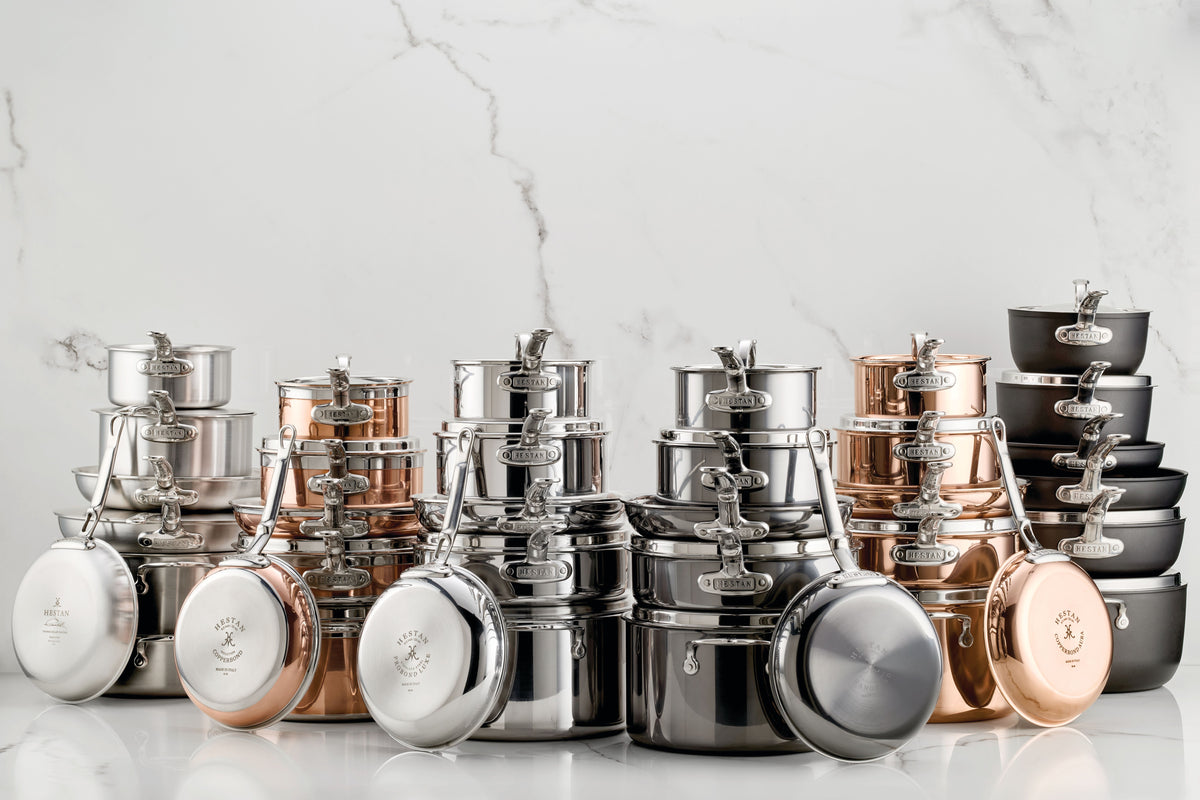Hestan Mixed Metals Cookware Collection on Marble Surface