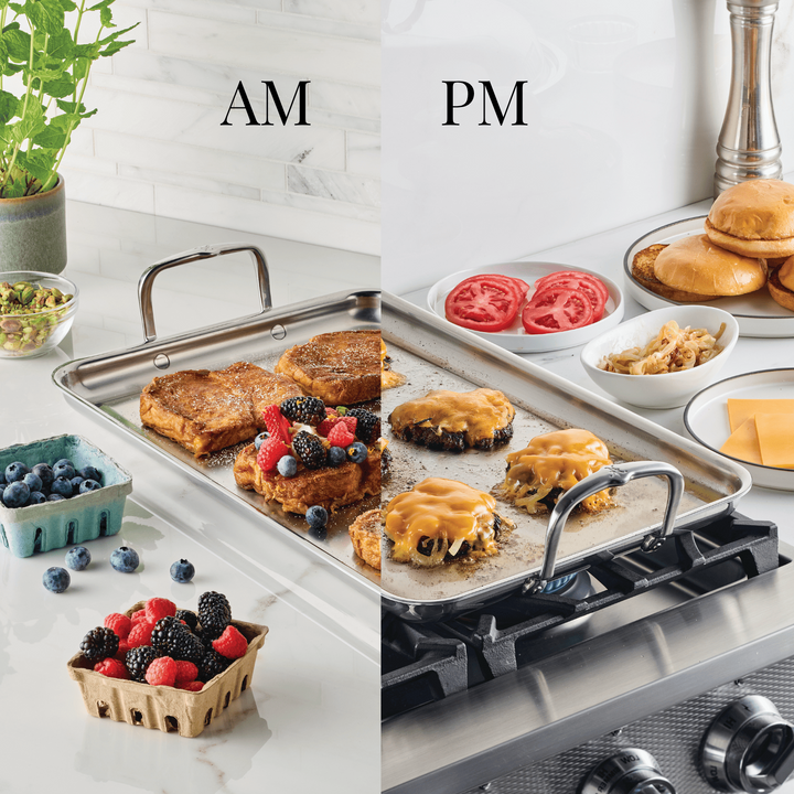 The Hestan Provisions Double Burner Griddle, 21-inch x 13-inch, is shown with French toast and berries on the AM side and cheeseburgers with toppings on the PM side, surrounded by fresh ingredients.