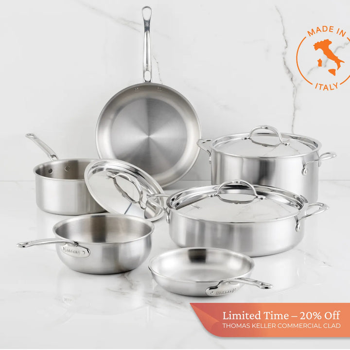 The Thomas Keller Commercial Clad Stainless Steel 9-Piece Cookware Set, made in Italy, is displayed on white marble. An orange badge reads Limited Time—20% Off.