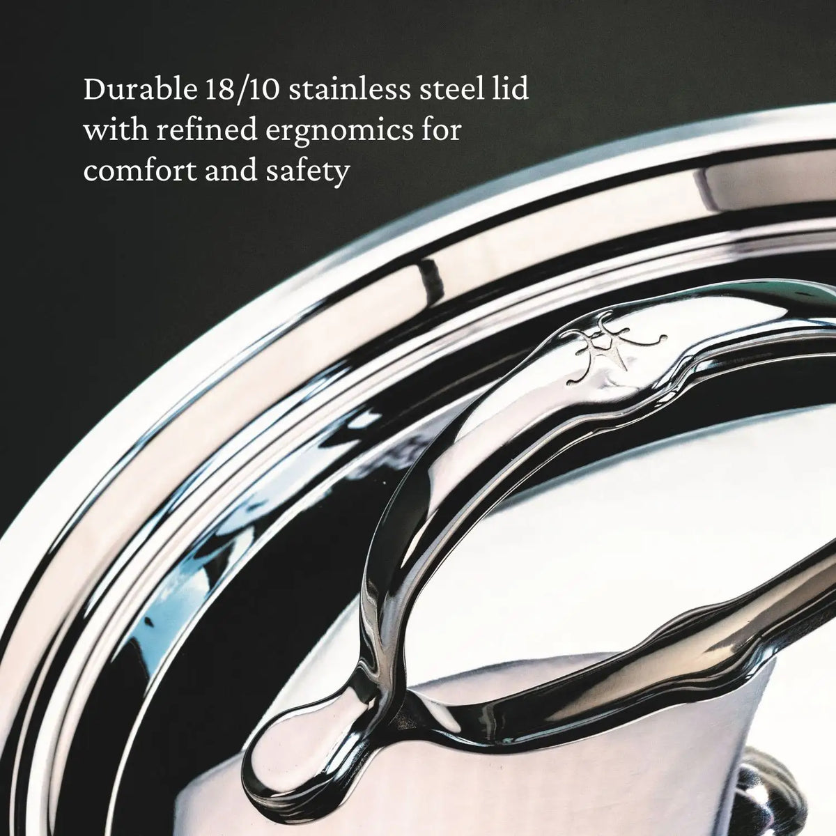The image features a close-up of a stainless steel pot lid highlighting the handle and part of the lid. Text reads, Durable 18/10 stainless steel lid with refined ergonomics for comfort and safety, from our ProBond Professional Clad Performance 28-piece Set.