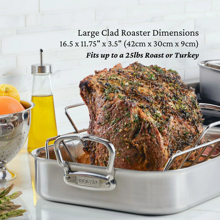 A large herb-seasoned roast sits in a ProBond Professional Clad Performance pan, crafted from stainless steel with a tri-ply aluminum core for even cooking. Nearby, oranges and asparagus complement olive oil, with text highlighting the pans dimensions and capacity.