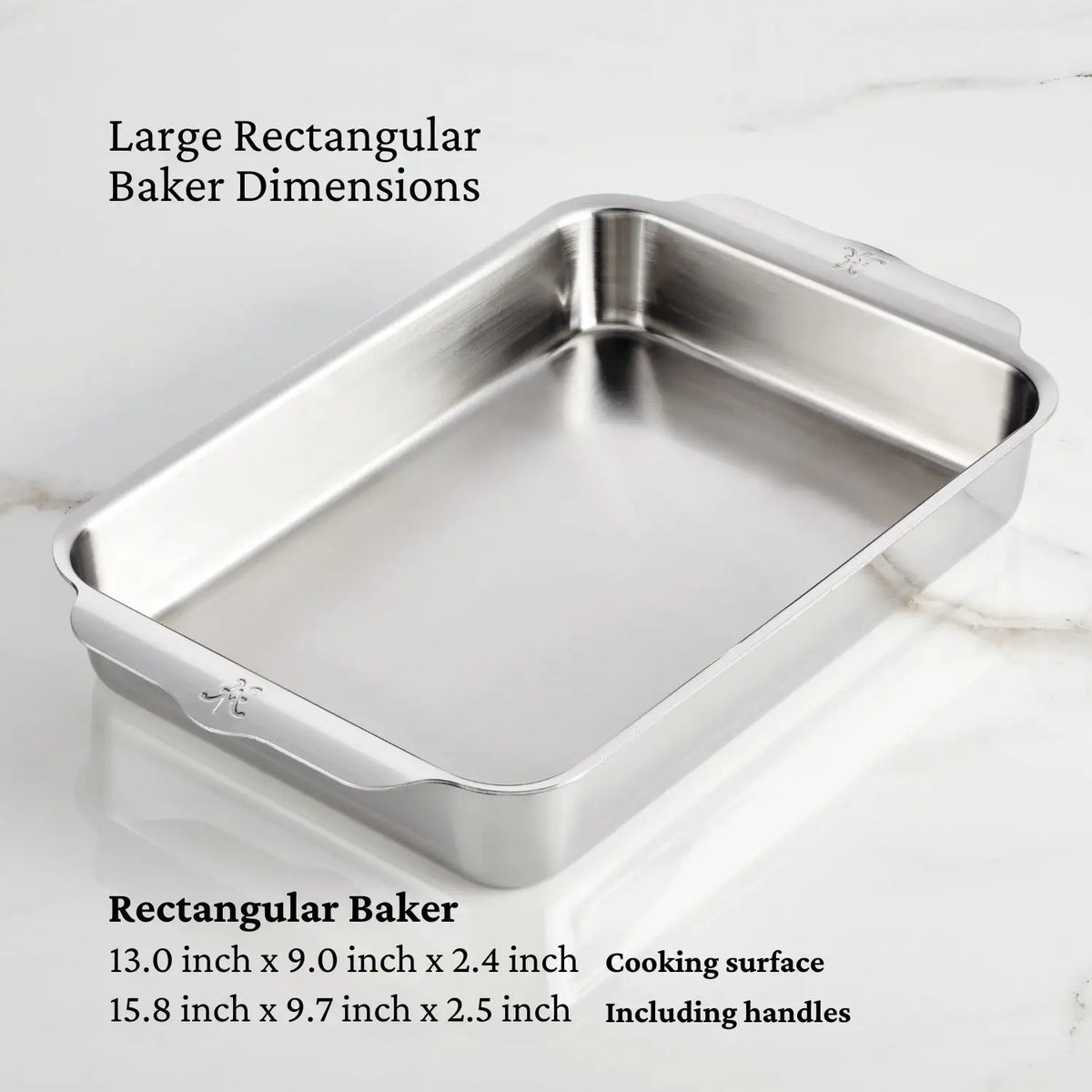 Part of the NanoBond Titanium x Tyler Florence 41-Piece Cookware Set, this rectangular baking pan measures 13.0 x 9.0 x 2.4 in. cooking area (15.8 x 9.7 x 2.5 in. with handles), making it ideal for any kitchen setup.