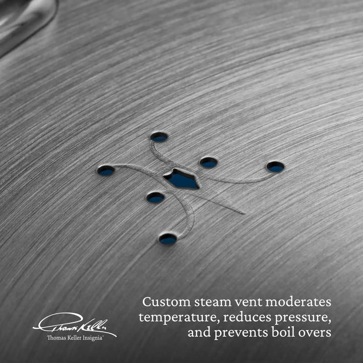 Close-up of a custom steam vent on a brushed metal surface from the Thomas Keller Insignia Commercial Clad Stainless Steel 10-Piece Cookware Set, featuring several small holes. Text reads, Custom steam vent moderates temperature, reduces pressure, and prevents boil overs. Logo in bottom left.