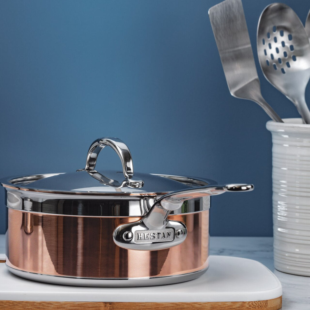 https://hestanculinary.com/cdn/shop/products/Copperbond_Induction_Copper_Saucepan_-_large_lifestyle_2__79516.jpg?v=1700794799&width=1080